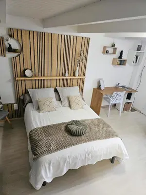 Un ou plusieurs lits dans un hébergement de l'établissement Le Cottage