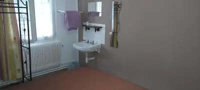 Salle de bains dans l'établissement Le Parisien