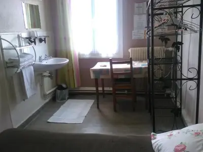 Salle de bains dans l'établissement Le Parisien