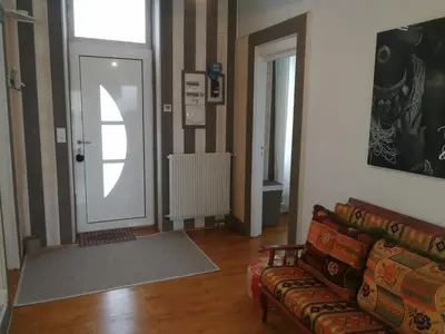 Coin salon dans l'établissement Comme chez vous