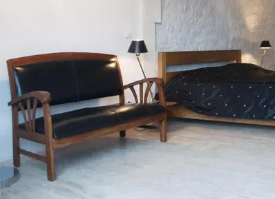 Un ou plusieurs lits dans un hébergement de l'établissement Chambre d'Hôtes Clos des Pierres Blanches