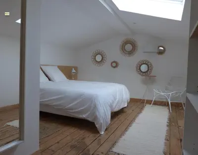 Un ou plusieurs lits dans un hébergement de l'établissement Maison En Ville