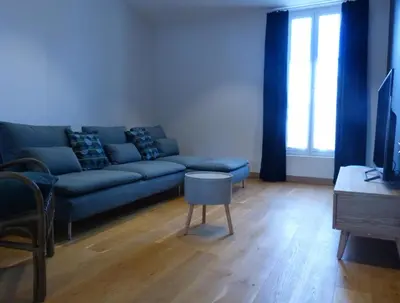 Coin salon dans l'établissement Maison En Ville