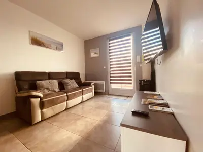 Télévision ou salle de divertissement dans l'établissement Villa Atlantique Rochefort