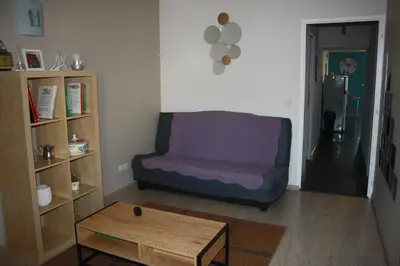 Coin salon dans l'établissement Gite De LA BALLADE