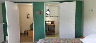 Un ou plusieurs lits dans un hébergement de l'établissement La Maison des Escargots