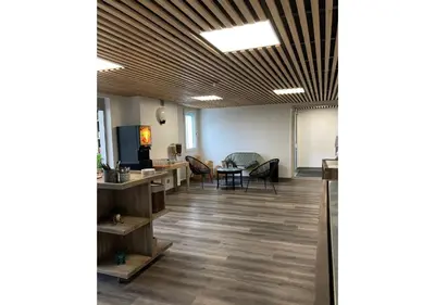 Coin salon dans l'établissement Première Classe La Rochelle Sud-Aytré