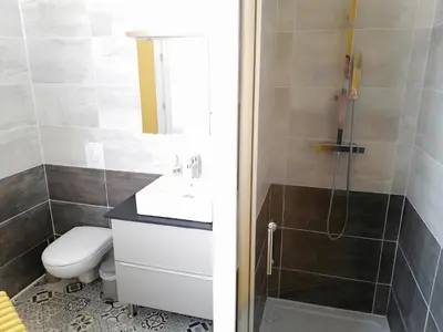 Salle de bains dans l'établissement L'Angély - Chambres d'Hôtes