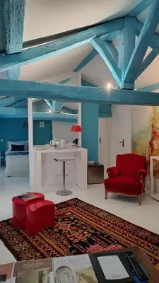 Coin salon dans l'établissement Hôtel du Palais