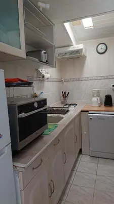 Cuisine ou kitchenette dans l'établissement La campagne a la mer