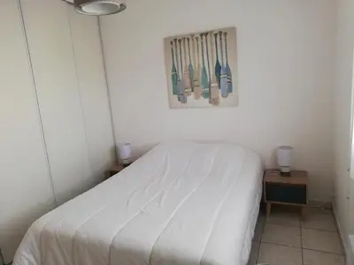 Un ou plusieurs lits dans un hébergement de l'établissement Appartement la Rochelle