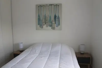Un ou plusieurs lits dans un hébergement de l'établissement Appartement la Rochelle