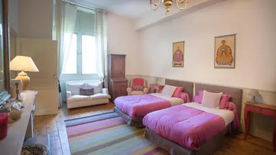 Un ou plusieurs lits dans un hébergement de l'établissement Chateau de Maumont