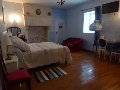 Coin salon dans l'établissement Le Logis de Faugerit