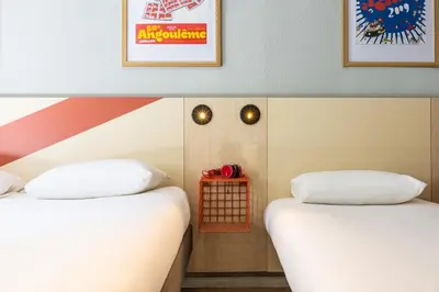 Un ou plusieurs lits dans un hébergement de l'établissement ibis budget Angoulême Centre