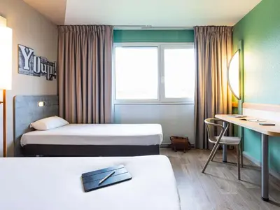 Un ou plusieurs lits dans un hébergement de l'établissement ibis budget Angoulême Nord
