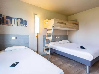 Un ou plusieurs lits dans un hébergement de l'établissement ibis budget Angoulême Nord
