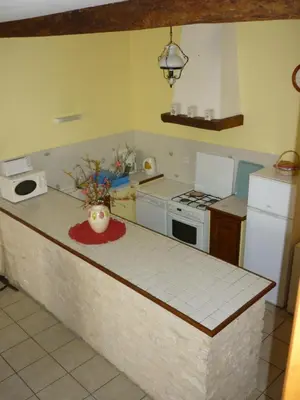 Cuisine ou kitchenette dans l'établissement Gîte Le Logis de Faugerit