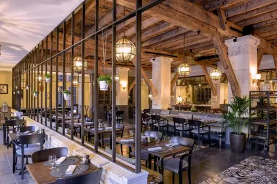 Restaurant ou autre lieu de restauration dans l'établissement Hôtel Chais Monnet & Spa