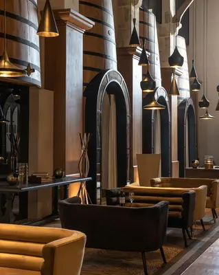 Coin salon dans l'établissement Hôtel Chais Monnet & Spa
