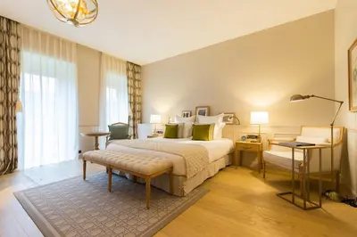 Un ou plusieurs lits dans un hébergement de l'établissement Hôtel Chais Monnet & Spa