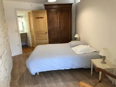 Un ou plusieurs lits dans un hébergement de l'établissement Maison de charme LA ROCHELLE ILE DE RE