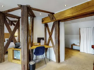 Télévision ou salle de divertissement dans l'établissement Mercure Poitiers Centre