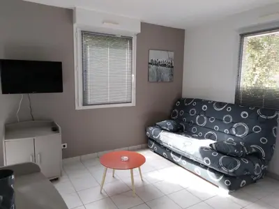 Coin salon dans l'établissement Pescalis Résidence Les Maisons du Lac