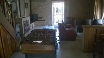 Télévision ou salle de divertissement dans l'établissement GITE DE SANSAIS