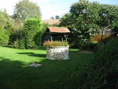 Jardin de l'établissement Logis Hôtel Beauséjour