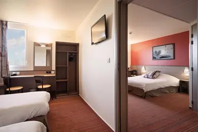 Un ou plusieurs lits dans un hébergement de l'établissement Ace Hotel Poitiers