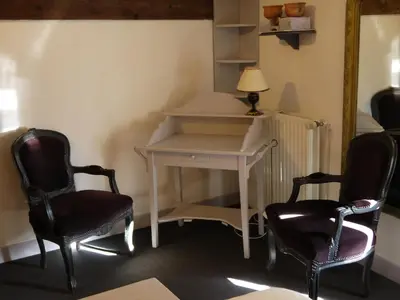 Coin salon dans l'établissement Chambres d'Hôtes - Les Bujours
