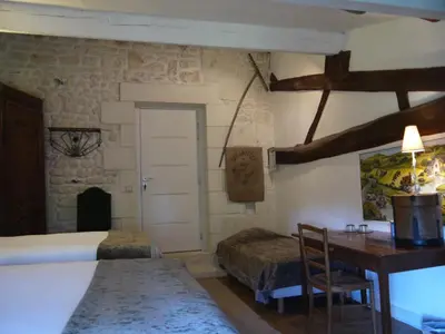 Un ou plusieurs lits dans un hébergement de l'établissement Chambres d'Hôtes - Les Bujours