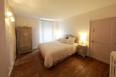 Un ou plusieurs lits dans un hébergement de l'établissement La Loge des Fées