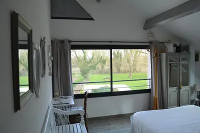 Un ou plusieurs lits dans un hébergement de l'établissement B&B La Laiterie de Fontpatour
