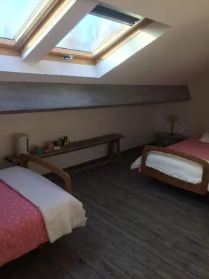 Un ou plusieurs lits dans un hébergement de l'établissement B&B La Laiterie de Fontpatour