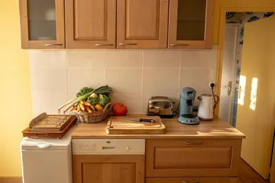 Cuisine ou kitchenette dans l'établissement Coeur-de-charente-maritime, au fil de l'eau