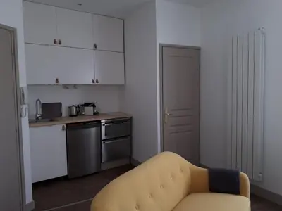 Cuisine ou kitchenette dans l'établissement Un Appart en Ville