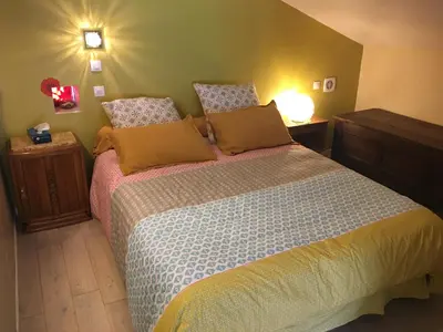 Un ou plusieurs lits dans un hébergement de l'établissement Chambre d'hôtes chez Denis et Margot