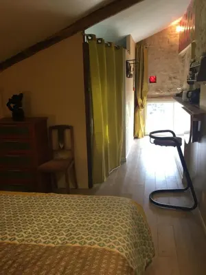 Un ou plusieurs lits dans un hébergement de l'établissement Chambre d'hôtes chez Denis et Margot