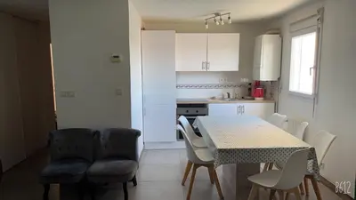 Cuisine ou kitchenette dans l'établissement Appartement Futuroscope-J'