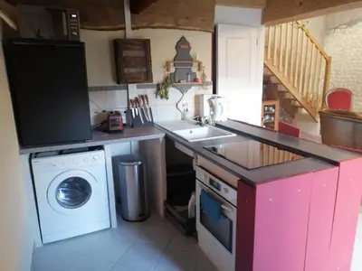 Cuisine ou kitchenette dans l'établissement Têtes à l'air
