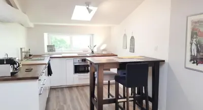 Cuisine ou kitchenette dans l'établissement La Loge du Grand Cèdre, gîte de charme