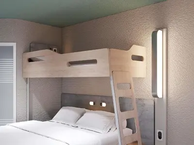 Un ou plusieurs lits dans un hébergement de l'établissement ibis budget Poitiers Nord Futuroscope
