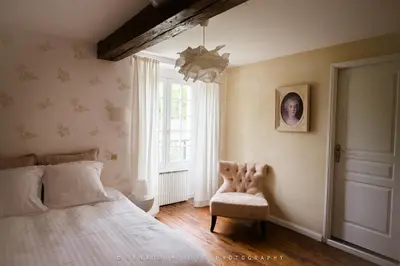 Un ou plusieurs lits dans un hébergement de l'établissement Maison d'hôtes le Moulin de Bois Coûtant