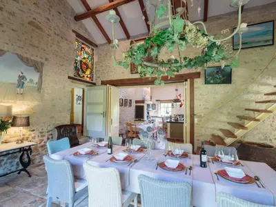 Coin salon dans l'établissement Holiday Home Moulin De Mois by Interhome