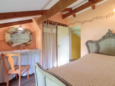 Un ou plusieurs lits dans un hébergement de l'établissement Holiday Home Moulin De Mois by Interhome