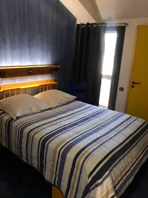 Un ou plusieurs lits dans un hébergement de l'établissement Le Relais d'Etagnac