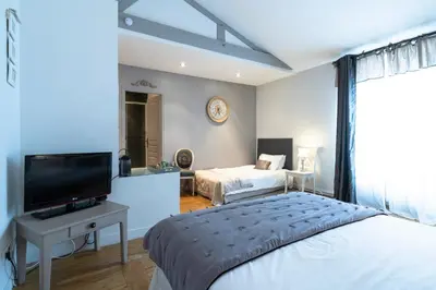 Un ou plusieurs lits dans un hébergement de l'établissement La Maison de Marc