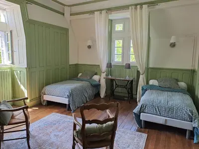 Un ou plusieurs lits dans un hébergement de l'établissement Château de la Redortière
